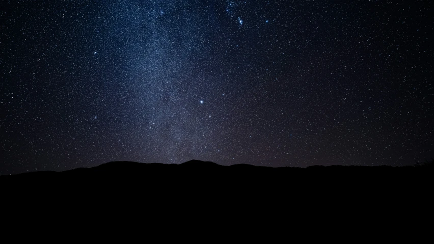 a view of the night sky with stars