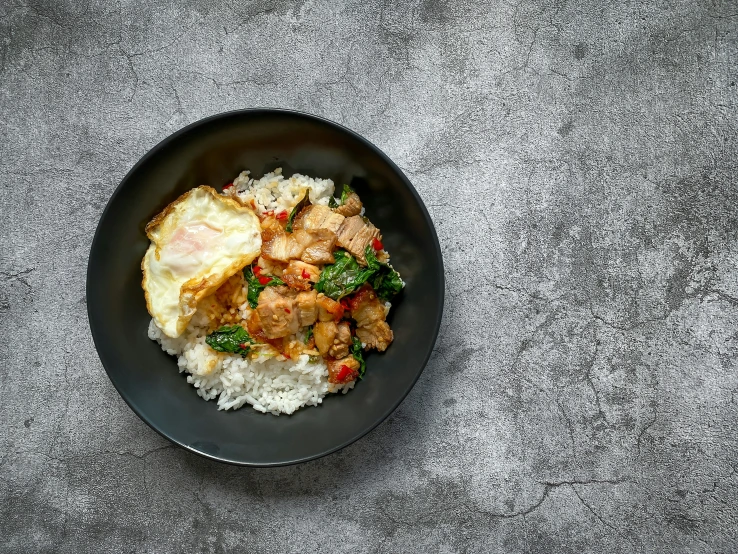 a close up of a plate of food with rice