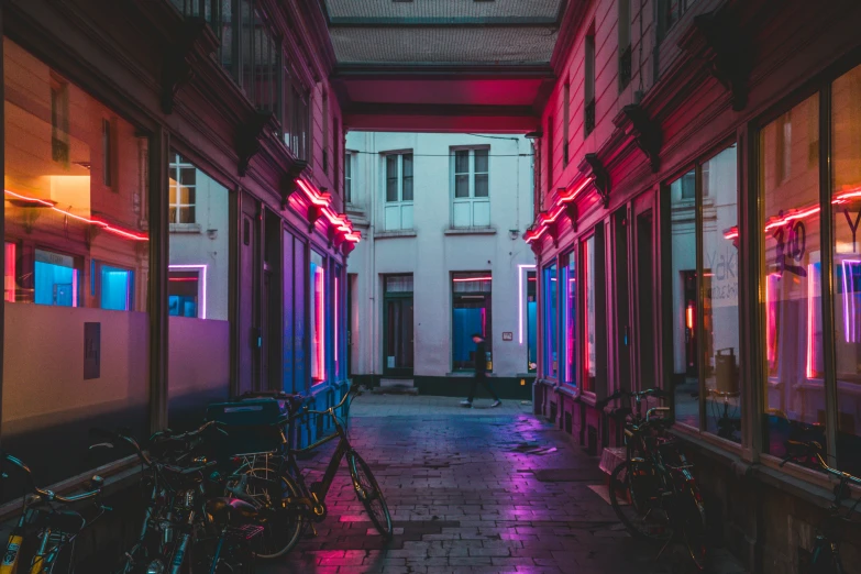 bikes parked inside the entrance to a building