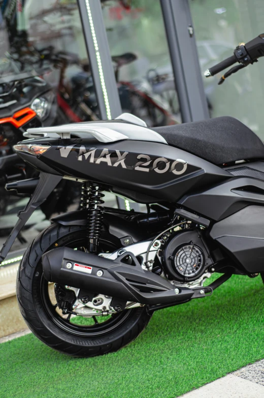 a close up of a motorcycle parked in front of a building