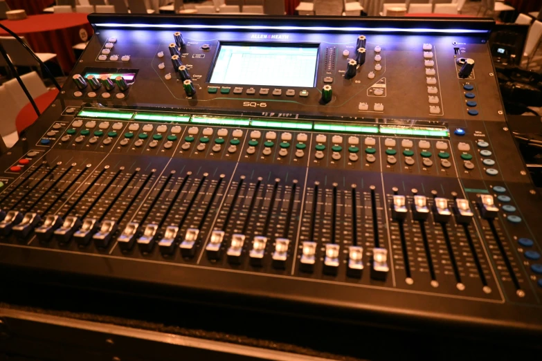 the sound mixing console in the recording studio