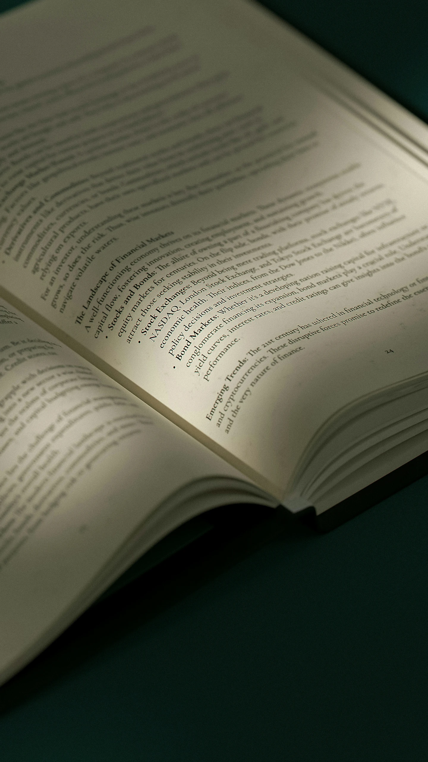 an open book with text that is on a table