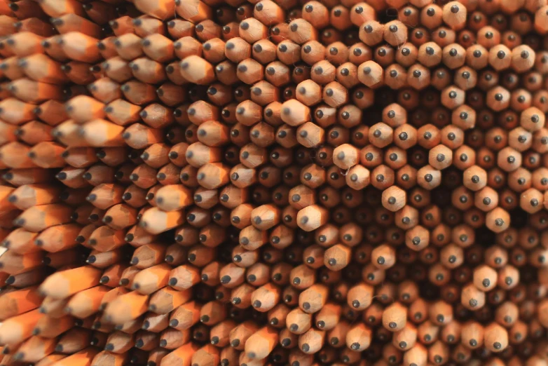 the image shows several wooden balls all in one pattern