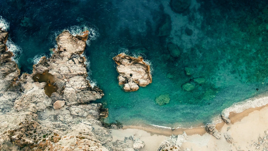 view of a turquoise body of water in the ocean