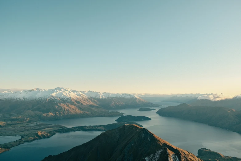 a view from the top of a mountain of water, and mountains