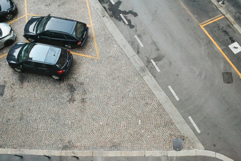 a group of cars parked in a parking lot