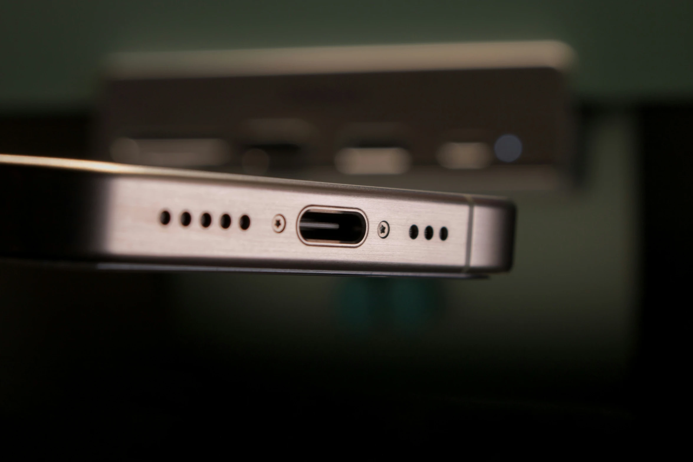 a computer terminal sitting on top of a shelf