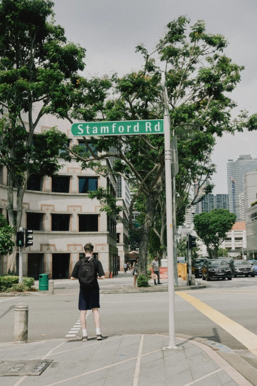 a young man standing at the corner of sea grove blvd and third ave