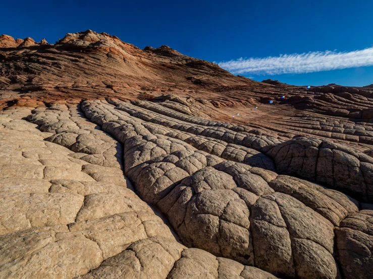 the rocks are moving quickly along the surface of the rock