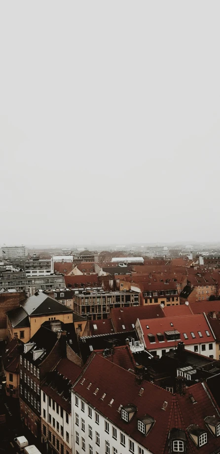 a black and white po of a town with rooftops