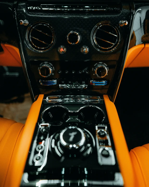 the dashboard of a vehicle with a number of ons and controls