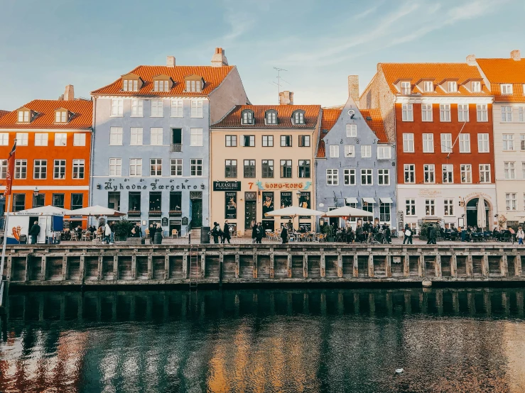 the view is of the buildings along the water