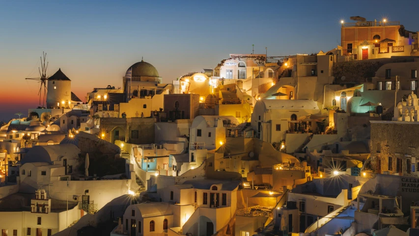 a group of buildings sitting on top of a hillside