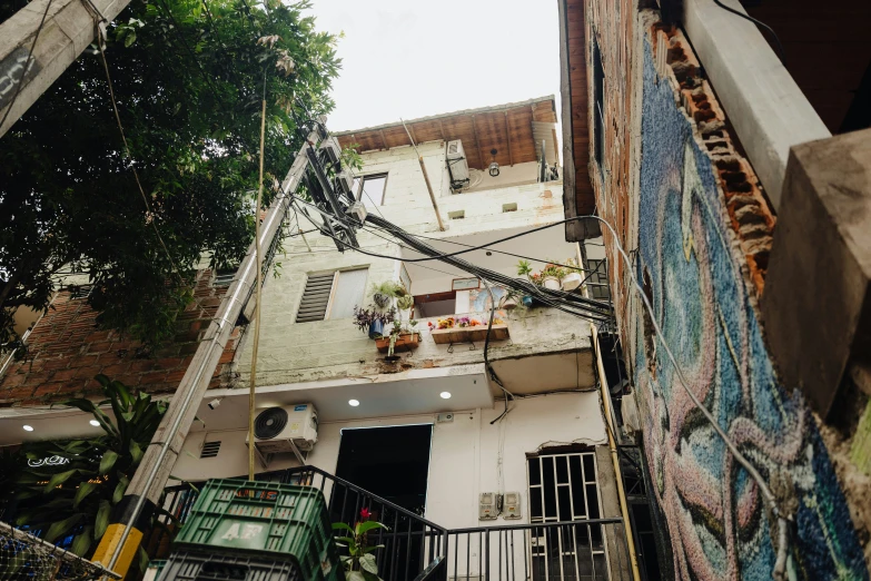 an overhead view shows a narrow house in the city