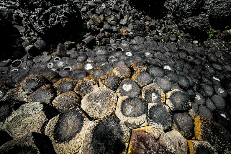 the view from above a black paved area at night