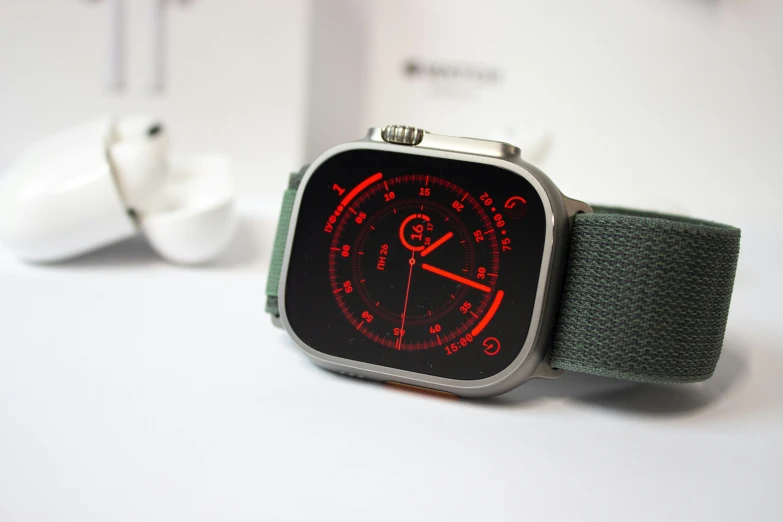 an apple watch is showing red leds on its face