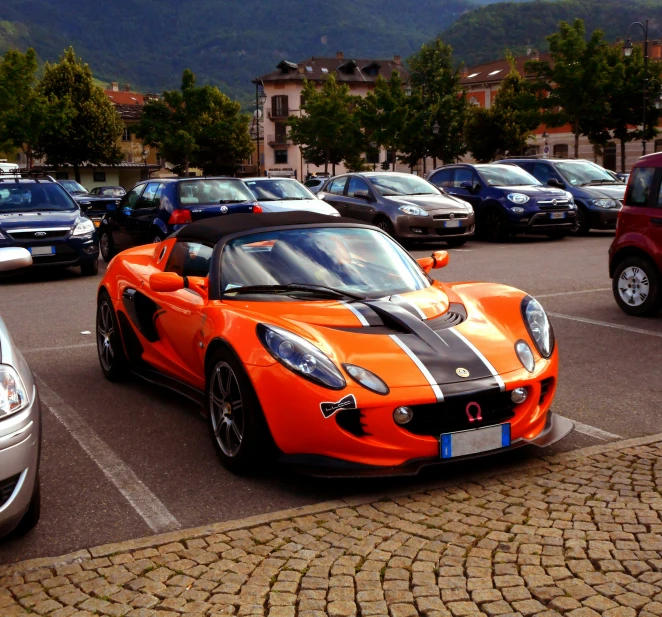 the cars are parked in the lot near each other