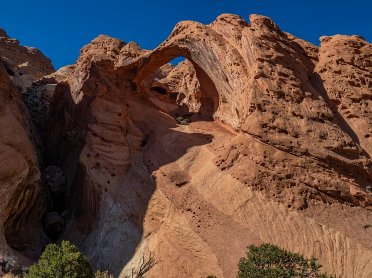 a picture of a rock formation with a sky background