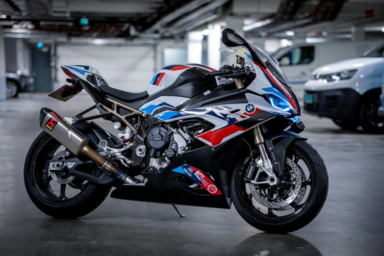 a motor bike is parked in an empty parking lot