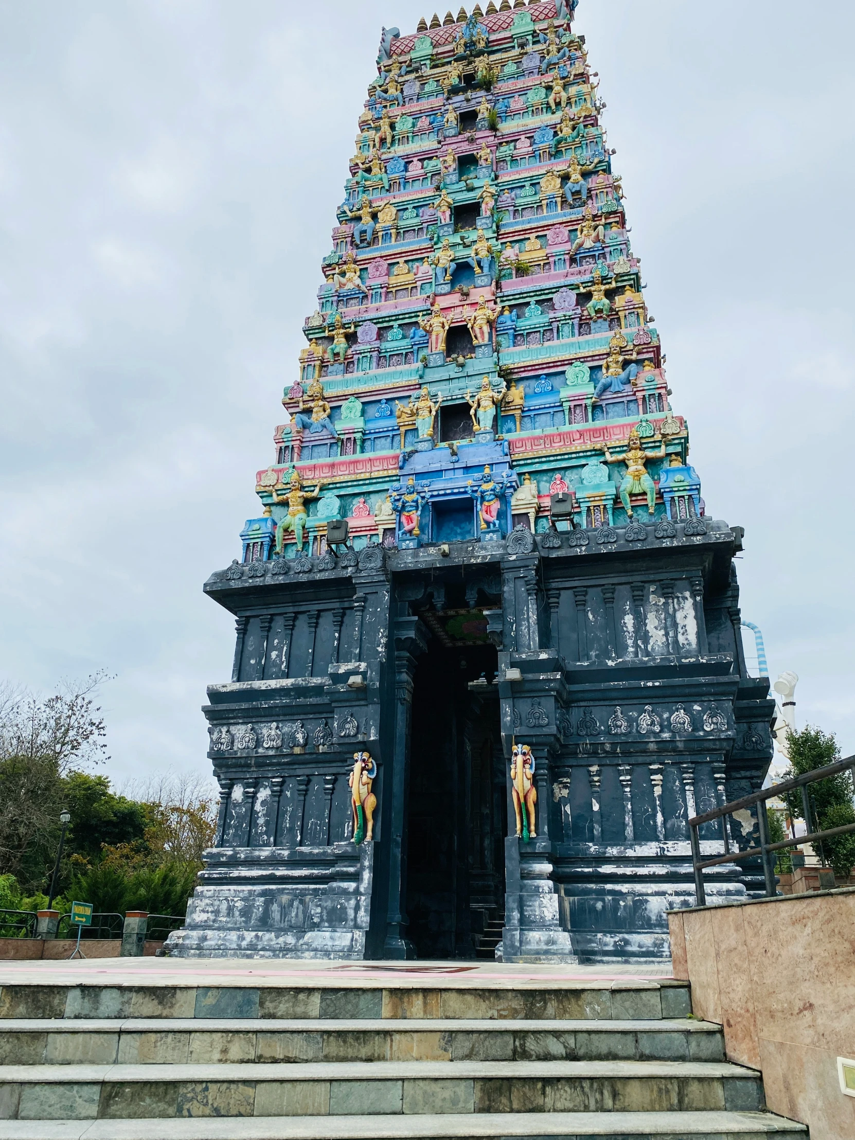 a very large colorful structure near some steps