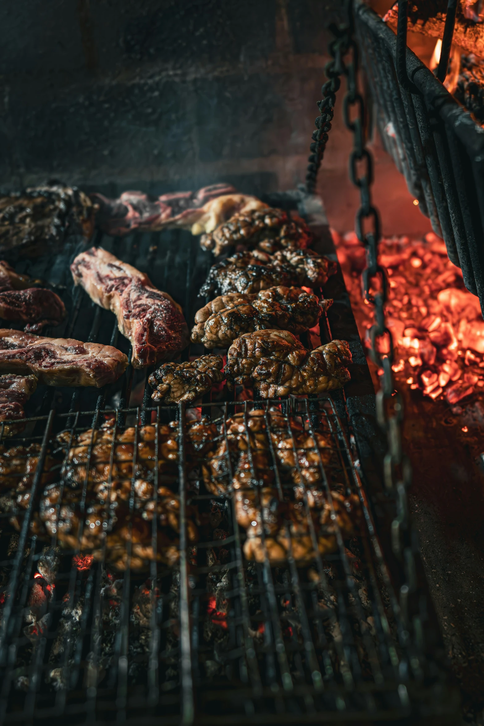 various food is being cooked over an open grill