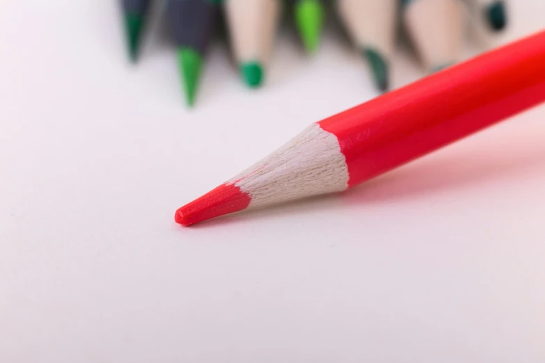 two red pencils and a group of sharpeners