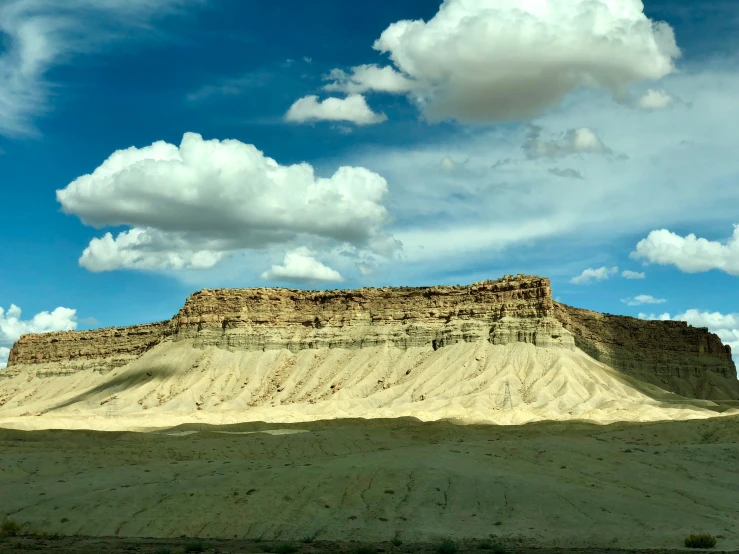 a large mountain that is very low to the ground