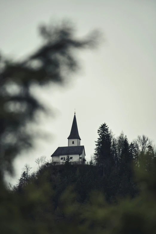 a tall church perched on top of a hill