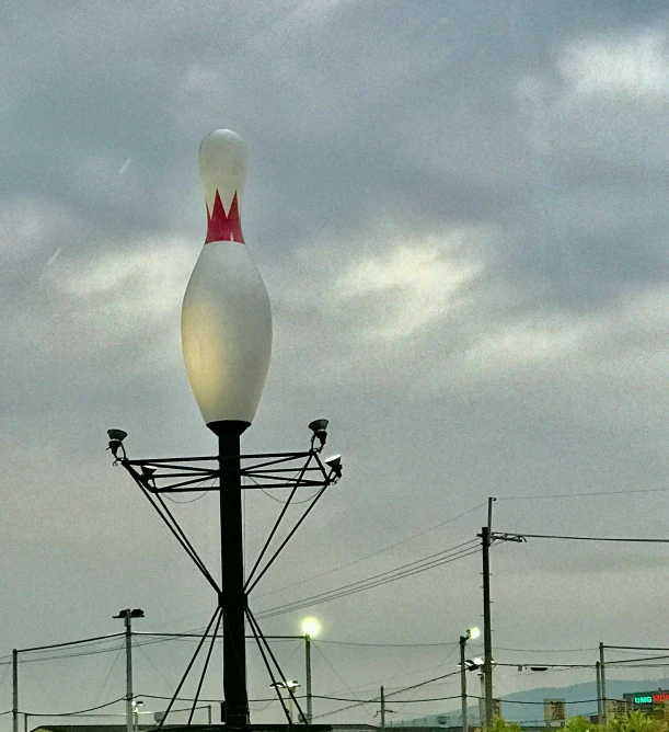 a large street light on top of a metal pole