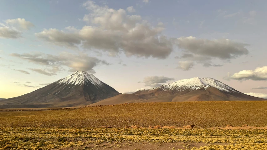 the two very tall mountains in the distance