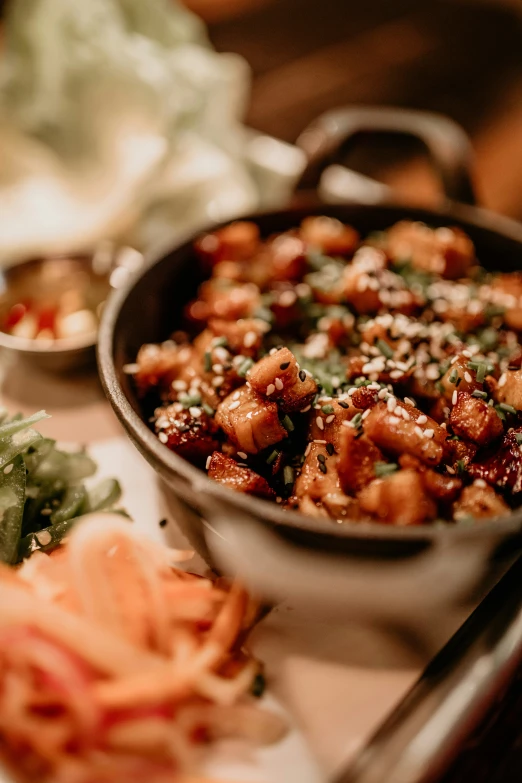 an assortment of food items in bowl and plates