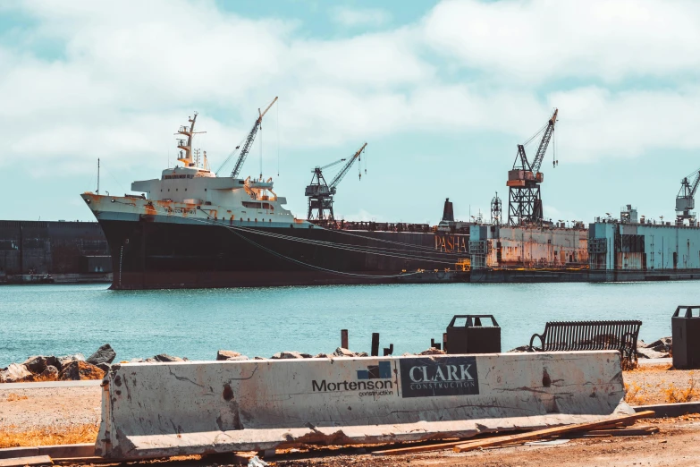 a boat docked in a large body of water