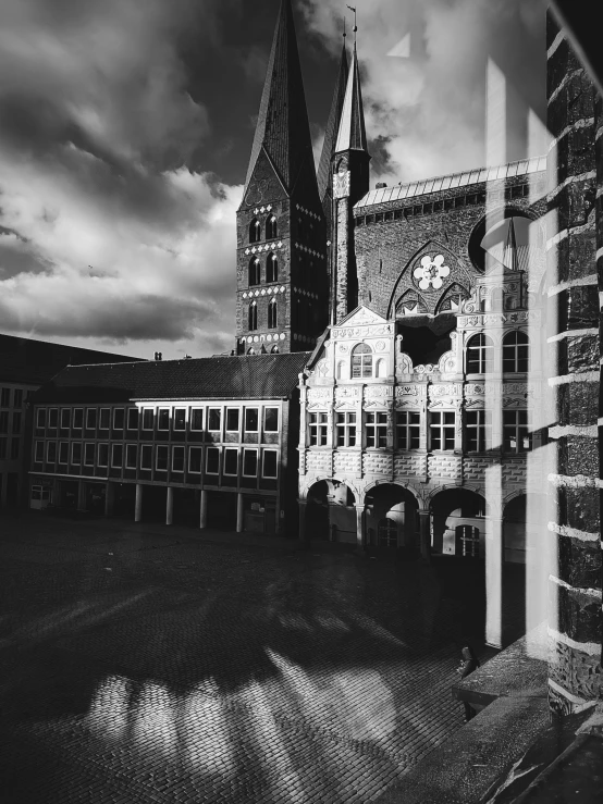 a black and white image of a building with a clock tower