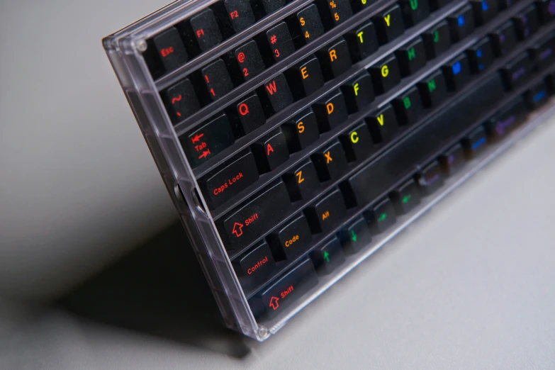 a close up of the back cover of an old fashioned keyboard