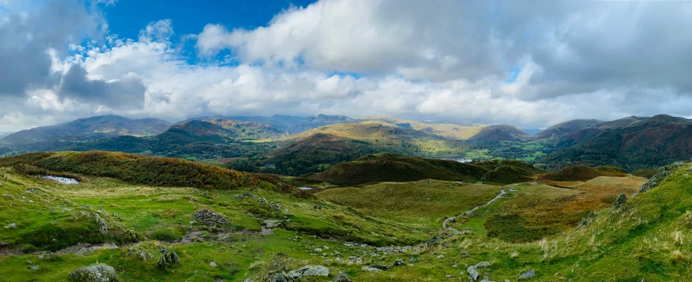 there is a view of some mountains and clouds