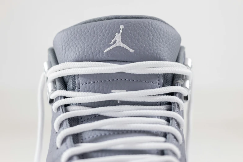 a pair of jordans is shown with white lace