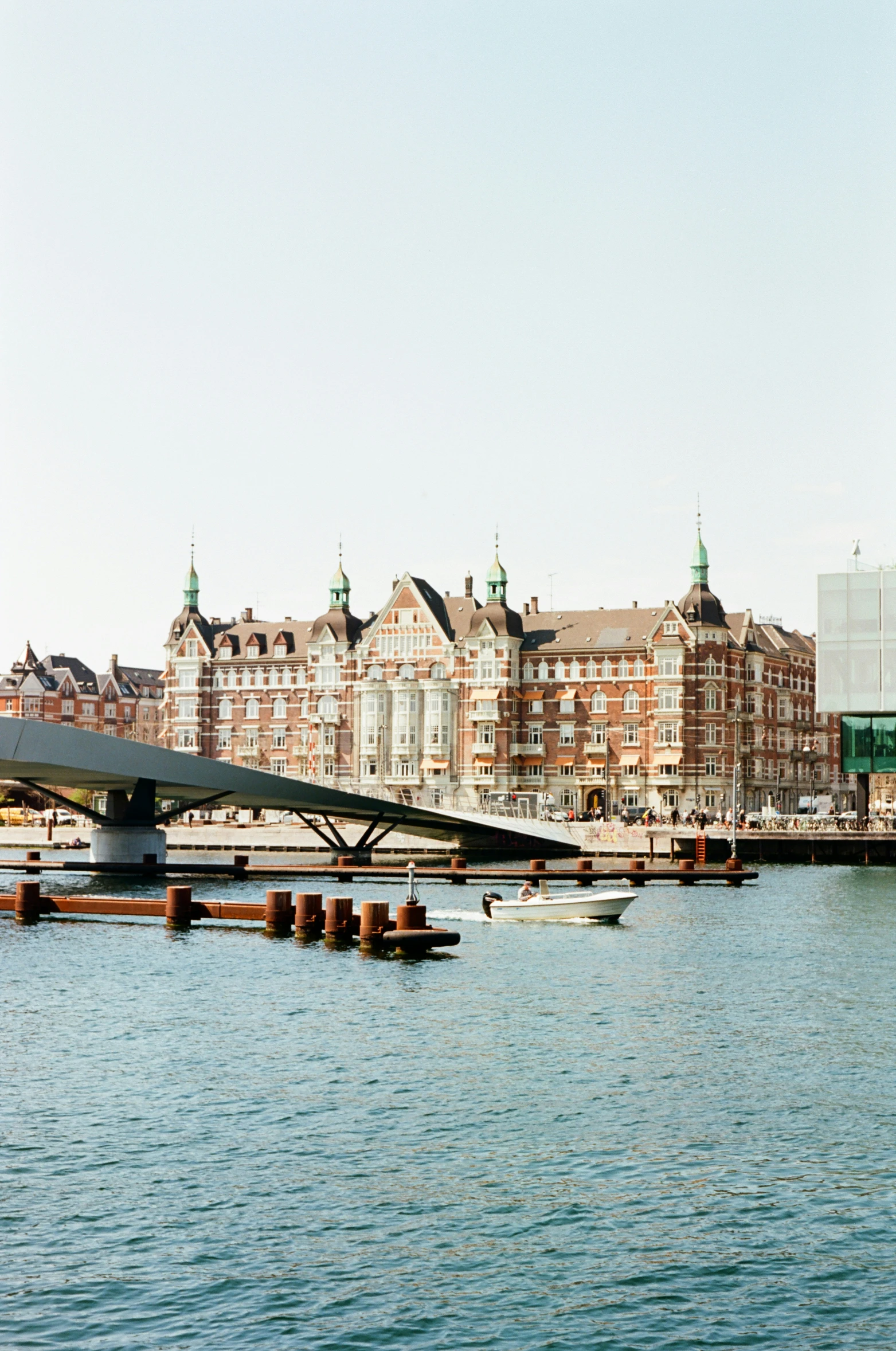 buildings on the shore line along the water