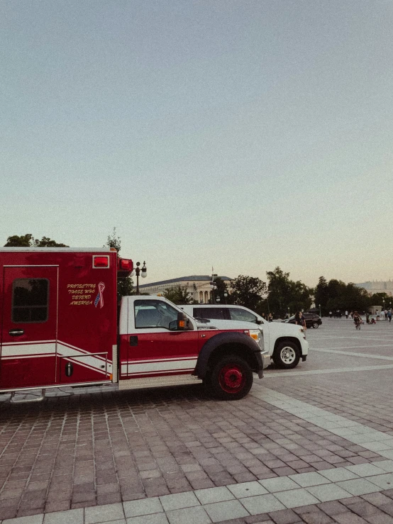 an image of a red truck parked by itself