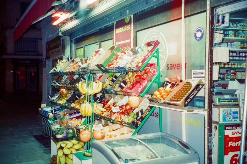 a fruit stand selling fresh fruit and vegetables