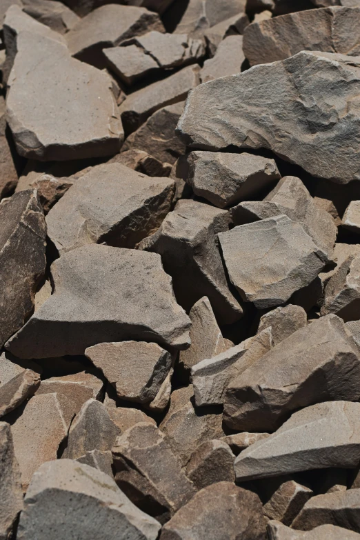 an extreme closeup s of several stones and gravel