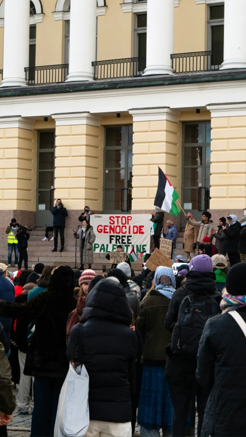 a protest against israel and palestinian democracy on a street