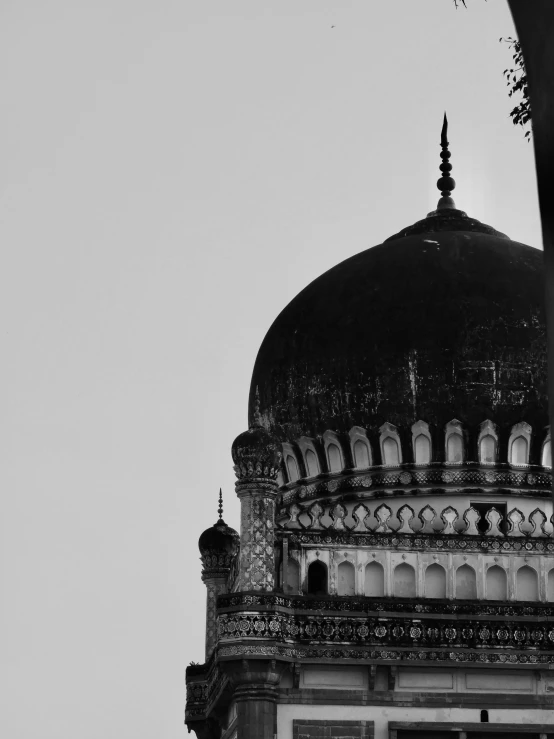 there is a black and white image of an outside building