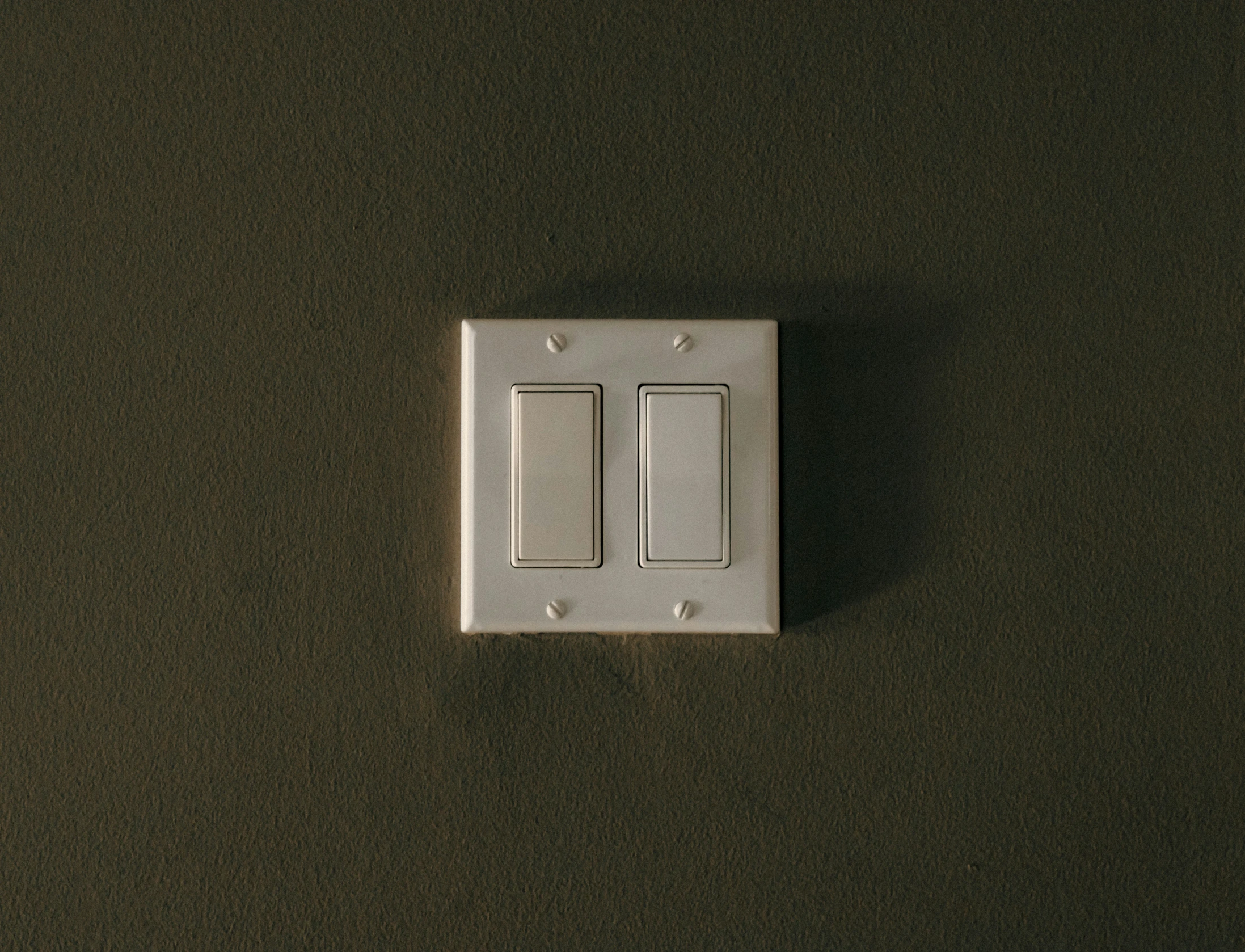 an electrical device switch on the wall