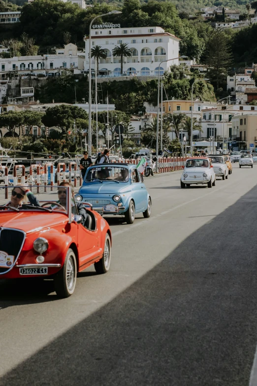 a large group of cars parked along side each other