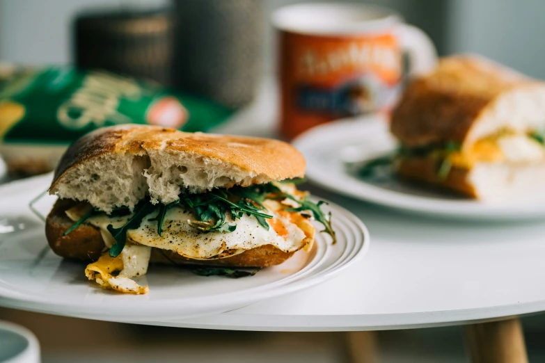 a white plate topped with a chicken sandwich