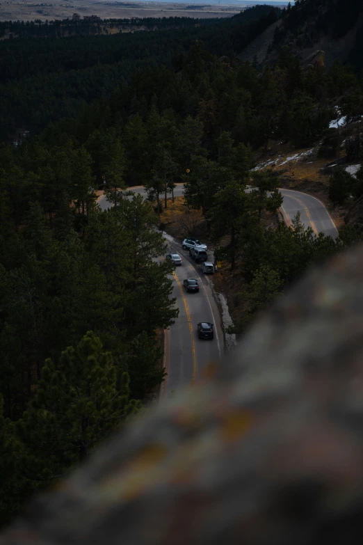 a picture taken from the top of a hill at night time