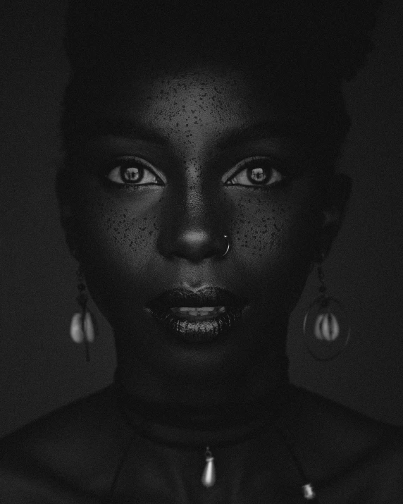 a black woman with glowing eyes posing for a picture