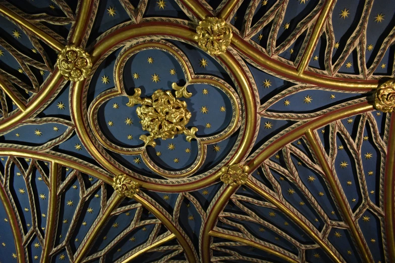 a decorative gold and blue panel is seen