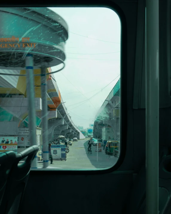 people ride on the bus along the street in town