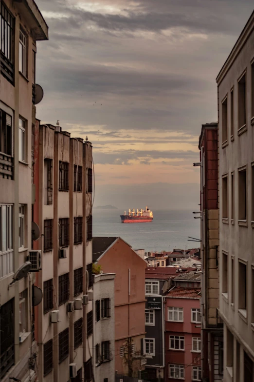 an image of a ship in the distance from a city